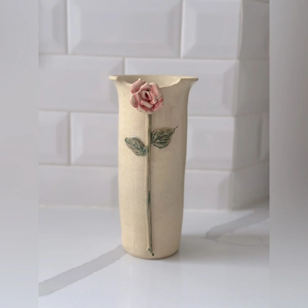 Vintage ivory vase with rose